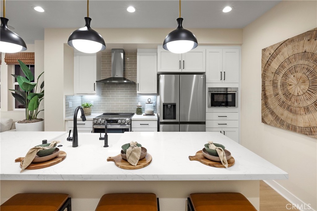 City Ventures' newest neighborhood in El Cajon. Solar included townhomes featuring all-electric stainless kitchen appliances and smart built-in technology. Lot 21 features 3 bedrooms, open kitchen with island. Photos are of model home and not actual home for sale.