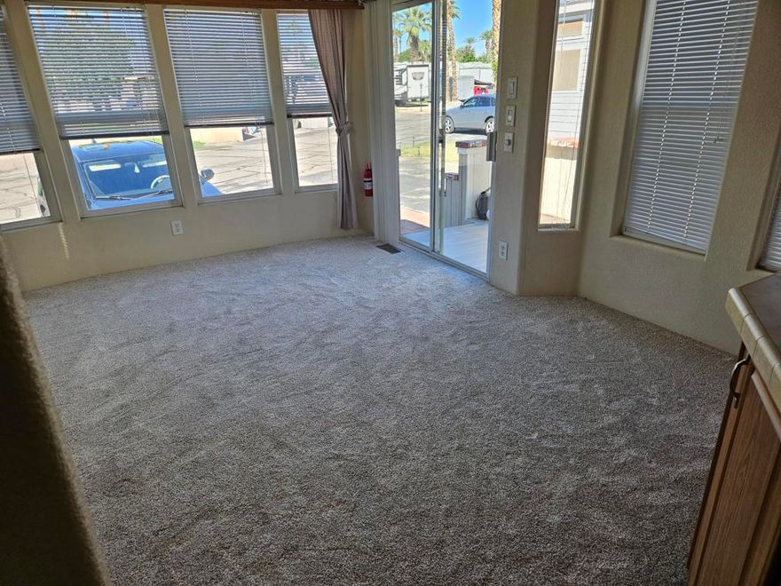Located in the desirable Indian Wells RV Resort, this well-kept park model offers two bedrooms, one full bath, a comfortable living room, a functional kitchen, and a convenient storage shed. The community provides a full range of amenities, including free WiFi, cable TV access, a mail center, recycling areas, restrooms and showers, pet area, swimming pool, hot tub, basketball and shuffleboard courts, fitness center, biking paths, game room, library, on-site laundry facilities ($), and ice availability ($). Situated in a prime location close to Home Depot, Costco, and local shopping, this property offers outstanding value and convenience in the heart of the desert.