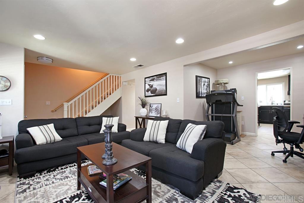 Beautifully Updated Townhome in Gated Felicita Villas, Escondido Welcome home to this light-filled, two-story townhome in the desirable gated community of Felicita Villas. Every detail has been thoughtfully updated to blend modern style with everyday comfort. Designer Kitchen: Brand-new cabinets, roof, quartz countertops, subway tile backsplash, stainless steel appliances, farm sink, and an oversized pantry with tall glass sliding doors. Fresh Upgrades Throughout: New vinyl flooring, all new windows, new doors to every room, French doors, recessed CAN lighting, and ceiling fans in every room. Convenience: Indoor laundry room plus plenty of storage. Comfort All Year: New furnace, newer A/C unit, and a Murphy bed that conveys with the home. Outdoor Living: Private covered patio with new turf, perfect for relaxing or entertaining. Community amenities include a sparkling pool, soothing spa, and beautifully maintained grounds—all just minutes from freeways, shopping, and dining. This turnkey home has everything you’ve been looking for—all that’s left is to make it yours!