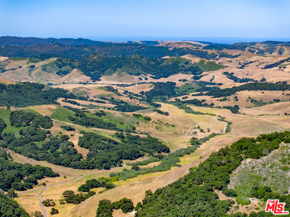 2688-acre Ytias Ranch. Once part of the Historic 48,000 acre Rancho San Julian Mexican Land Grant, this beautiful cattle ranch is located just north of the Scenic Hwy 1 corridor near the San Julian Headquarters. This is an area of large undeveloped ranches characterized by oak-forested rolling hills, verdant valleys, and tree lined creeks and springs. Privacy, serenity, natural beauty, wildlife, and easy access off of Hwy 1 are the predominant features of this special property.