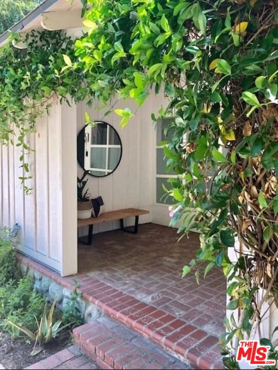 Photo of 3443 Mandeville Canyon Road, Los Angeles, CA 90049 (MLS # 26104022)