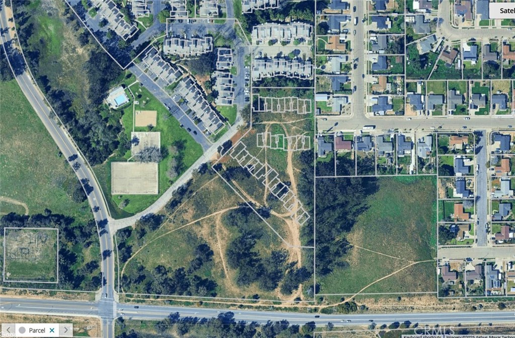 SUMMARY
This property offers a developer the chance to acquire a well-defined project with significant, pre-negotiated fee waivers and a resolved airport land use conflict. While it requires re-entitlement, the extensive project history and existing agreements provide a clear and de-risked roadmap for bringing 32 new homes to the attractive Orcutt market.
KEY FINANCIAL ADVANTAGES & REDUCED FEES
• No School Fees for OUSD: A recorded settlement agreement with the Orcutt Union School District means a future developer will not have to pay school impact fees to the OUSD. This represents a considerable savings, as the current OUSD residential development fee is $3.69 per square foot as of June 2024, a potential savings of $160,000.
• No Quimby/Park Fees: A settlement with Santa Barbara County states that Quimby/Park fees, currently $5,344 per single-family dwelling, will not be required as the map has already been recorded. This amounts to a potential savings of over $171,000.
• No Affordable Housing In-Lieu Fees: The same settlement agreement with the county determined that no affordable housing mitigation would be required for the project, representing another significant potential cost reduction.
• HOA Agreement in Place: A mediated settlement with the Northpoint Homeowner's Association (HOA) clarifies that this phase is not required to join the existing HOA but will contribute to shared road and drainage basin maintenance. This agreement provides a clear framework for managing shared infrastructure costs and mitigates potential disputes with the existing association.
DEVELOPMENT & ENTITLEMENT STATUS
• Expired but Clear Path Forward: While the previous Development Plan for the 32 units expired in 2018, the path to re-entitle the project is straightforward. The buyer will need to undergo a new Development Plan application consistent with the prior approvals.
• Favorable Airport Safety Zone Update: A 2023 revision to the Airport Land Use Compatibility Plan (ALUCP) has removed a "no build corridor" that previously conflicted with 15 of the lots, eliminating a significant past obstacle to development.
Streamlining Potential: The site may qualify for the permit streamlining provisions of SB 35, as it is in an urban area with 75% of its perimeter already developed.