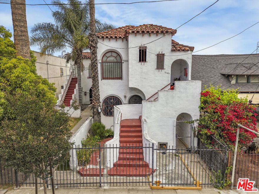 1716 Magnolia Avenue, a Spanish Colonial Revival four-unit property located in the Pico Union neighborhood of Los Angeles. Built in 1930 and totaling 2,492 square feet on a 4,879 square foot lot, the building offers one of the most attainable price points in the market today. With one unit delivered vacant at closing, the property is well suited for an entry-level investor seeking a house-hack opportunity while benefiting from strong long-term upside. Current rents are approximately 67% below market, providing a clear path for income growth through unit turnover and strategic renovations. Each unit includes in-unit laundry hookups and one private garage space, and recent exterior paint gives the building a clean, well-maintained appearance. The property is separately metered for gas and electricity, and the detached garages offer potential ADU conversion opportunities for future additional income (Buyer to verify).