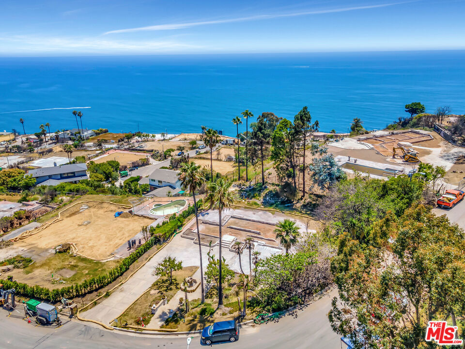 Here's a breakdown of the compelling features of this Malibu burnout lot in the Big Rock area: This lot offers expansive views of the Pacific Ocean, city lights (known as the Queen's Necklace), and even Catalina Island. Situated in the coveted Big Rock area, the location provides both seclusion and convenience, being just 3 miles from Sunset and PCH. Beyond the magnificent views, this property offers a distinct advantage as it's a burnout lot, meaning it was previously developed and retains valuable infrastructure. Existing amenities include a certified septic system, mature landscaping with a gorgeous backyard featuring two ponds and waterfalls, lawn, driveway, patios, and much of the original foundation remains intact. Burnout lots, due to their previous development, qualify for an expedited building permit process. This significantly reduces the typical timeframe and difficulty associated with obtaining permits in Malibu, potentially shortening the process by years. This allows for quicker construction and the ability to personalize the home with desired finishes in a fraction of the usual time. Investing in a burnout lot offers the potential for significant appreciation as the Big Rock neighborhood rebuilds with modern, state-of-the-art homes, replacing the original 1960s tract homes. This property presents a rare and desirable opportunity to build a custom dream home with unparalleled views and a significantly streamlined construction process in one of Malibu's most sought-after neighborhoods. In addition, you may be able to put a trailer or ADU on the property to utilize while waiting to build.
