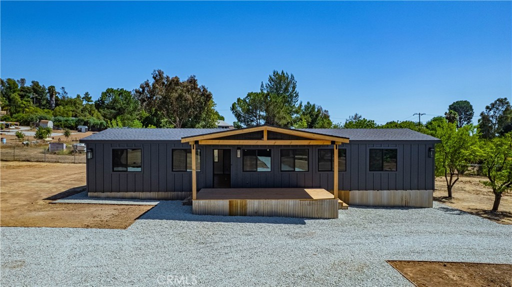 Welcome home to this 2.3 acre BRAND NEW REMODEL!!!!!! No expenses spared on this ground up remodel. Interior features include wide open floor plan with oak slab cabinets, leathered black granite throughout with huge kitchen island, 36” professional propane range, matching micro and dishwasher, designer light fixtures, can lights throughout, custom tiled showers, dual vanity bathroom, LVP flooring (No Carpet) Indoor laundry with large basin sink and walk in closet.
The exterior of the home was completed with low maintenance concrete board siding, high efficient black windows, New roof and AC. Relax and kick up your feet on the custom raised covered patio overlooking your 4 horse barn and large 40x40 garage with 2 additional storage containers.
Plenty of open space for and additional house or…………………