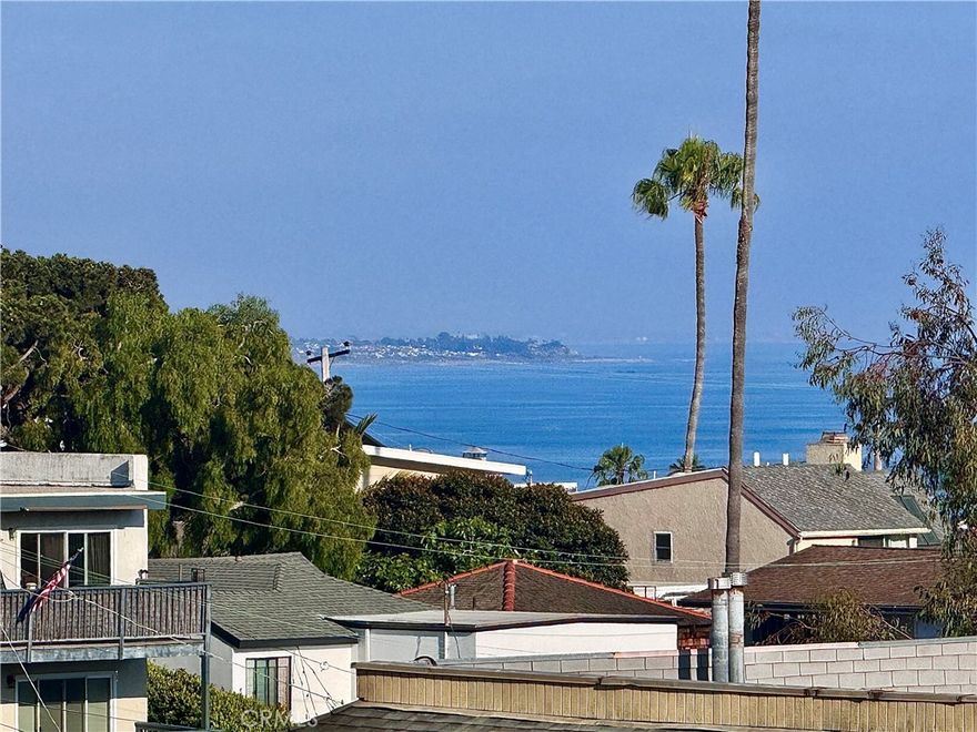 Completely remodeled with ocean views! Experience coastal living at its finest in this beautifully remodeled, turnkey townhome nestled in the heart of Dana Point. Spanning 1,387 square feet, this 2-bedroom, 2.5-bath residence has been thoughtfully redesigned from top to bottom with modern finishes and designer touches throughout. The reversed floorplan features the main living areas upstairs, where a bright and open layout showcases new luxury vinyl plank flooring, a completely remodeled kitchen, and expansive windows that frame tranquil ocean views. Downstairs, you’ll find two generously sized bedrooms, including a luxurious primary suite with a stylish en-suite bath and private access to downstairs patio. The secondary bedroom also has en suite bathroom with stylish tiled walls and new vanity and quartz countertops. Located near the bedrooms is a conveniently located in-unit laundry room. Every inch of this home has been upgraded, including a brand-new AC system for year-round comfort. The newly tiled bathrooms, sleek fixtures, and contemporary cabinetry elevate the overall aesthetic, blending comfort with sophistication. This unit has already been repiped with PEX piping as well. Ideally located just minutes from Dana Point’s beaches, harbor, restaurants, and shops, this turnkey townhome offers a rare opportunity to own a stylish coastal retreat ready for immediate enjoyment.