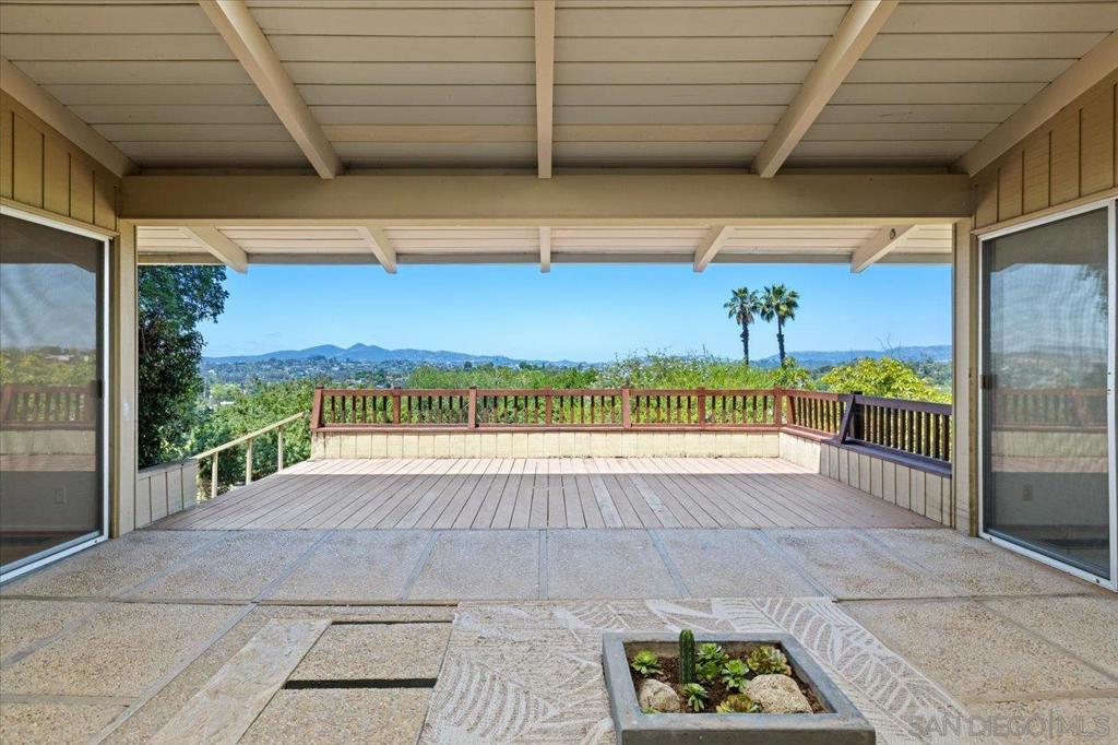 Charming contemporary style one-level home with detached guest house on 1.4 acres within walking distance of downtown Escondido. Main home features 2 large bedrooms plus a room that could be used as a 3rd bedroom. Enjoy panoramic views thru the dramatic picture window in the living room and from the huge back patio and deck. The guest house is totally separate and privet from the main home. It has a full bath, kitchenette, large private back deck and separate driveway for parking.