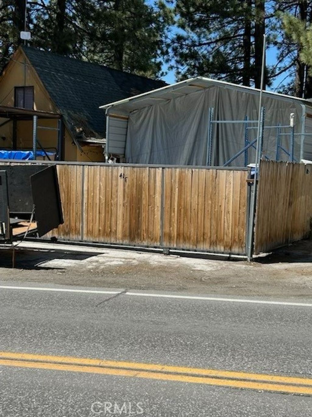 Photo of 413 W Big Bear Blvd, Big Bear City, CA 92314 (MLS # IV26082599)