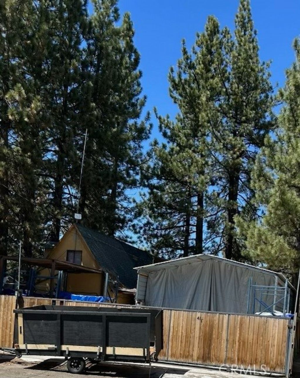 Photo of 413 W Big Bear Blvd, Big Bear City, CA 92314 (MLS # IV26082599)