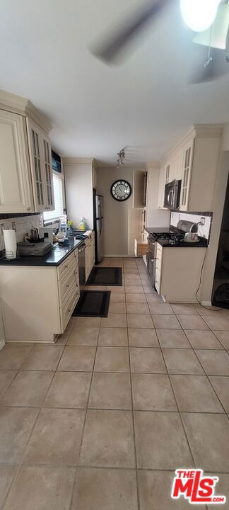 Photo of 6908 Remmet Avenue #8, Los Angeles, CA 91303 (MLS # 26959261)