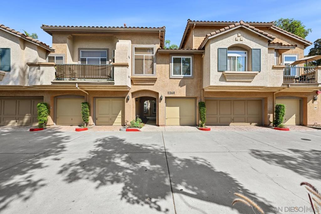 Located in the desirable community of Rancho San Diego, this 2-bedroom, 2.5-bath home offers the comfort and feel of a detached residence. The open floor plan features soaring vaulted ceilings, a cozy fireplace, and a dining area that flows seamlessly into the kitchen. There is a large private patio—perfect for indoor-outdoor living in the San Diego summer. Upstairs, you’ll find two spacious primary suites, each with its own bathroom for ultimate privacy. Additional highlights include an attached 1-car garage, FHA and VA approval, and a quiet location within the complex, just steps from the community pool and spa. With its bright, airy layout and prime location, this home combines convenience, style, and comfort in one inviting package.