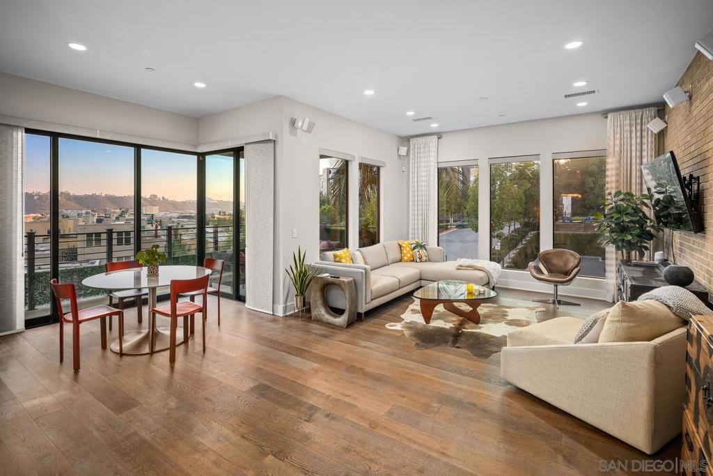 Perfectly positioned on the southwest corner of the building, this home offers expansive views of Mission Valley and is filled with high-end finishes and designer touches throughout. From the moment you step inside, you’ll notice the thoughtful upgrades, quartz countertops, a striking brick accent wall, designer lighting, and remote-controlled window shades that add both style and convenience. The open-concept layout is perfect for entertaining or relaxing in luxury. The spacious primary suite features elegant coffered ceilings, a custom walk-in closet with built-in drawers and shelving, and direct access to a private patio, ideal for your morning coffee or evening wind-down. The third bedroom is currently set up as a home office but can be converted back to a bedroom to suit your needs. Located in one of Mission Valley’s most sought-after communities, this is a rare opportunity to own a truly special home in Lucent II. Civita is one of Mission Valley’s most sought-after communities, known for its modern design, walkable layout, and unbeatable central location. Just minutes from the beach, downtown San Diego, and Snapdragon Stadium, Civita offers the perfect blend of city access and relaxed community living—all within a 15-minute drive. This vibrant neighborhood is packed with everyday conveniences and unique local spots. From LA Fitness and a neighborhood vet to casual dining, coffee shops, and boutique retail, everything you need is just steps away. At the heart of it all is Civita Park—a beautiful 14-acre space that features lush gardens, winding trails, basketball courts, amphitheaters, and open lawns for picnics or events. The nearby Civita Recreation Center adds even more with resort-style pools, a state-of-the-art gym, and outdoor gathering spaces perfect for hosting or relaxing. And there’s more to come. The upcoming development along Civita Boulevard—called The Row—will bring even more energy to the community with a vibrant lineup of restaurants, retail, and services. Whether you’re looking for convenience, connection, or simply a modern place to call home, Civita offers a lifestyle that’s hard to match in San Diego.
