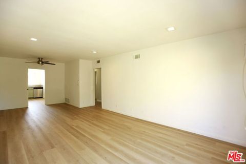 Photo of 1323 S Ridgeley Drive #5, Los Angeles, CA 90019 (MLS # 26670893)