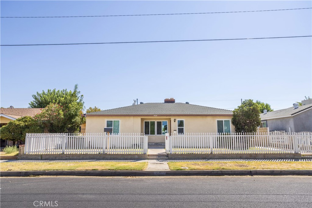 **Investor Special High ROI Potential!** Clean and move-in ready with new dual-panel windows, security cameras installed, and well-maintained front and back yards for immediate appeal. Includes microwave, stove, and washer.
Major systems already upgraded: newer sewer line, water heater, and roof. Original natural wood flooring under carpet adds future renovation value.
Sitting on a large lot, the property offers plenty of rear parking ideal for RV access or multi unit development. Existing sewer layout supports additional construction.
Interior features a larger-than-average kitchen with ample cabinets and breakfast area. Spacious bedrooms, with the private rear bedroom offering potential conversion to a 1-bed rental unit.
Just blocks from the gentrifying Lancaster Blvd, the home comes with approved permits to build a 660 sq ft Junior ADU at the detached garage plus room to develop an additional 3-unit structure. Perfect opportunity for investors seeking immediate cash flow and long-term development potential. All the heavy lifting is done just collect rents or build out your vision!