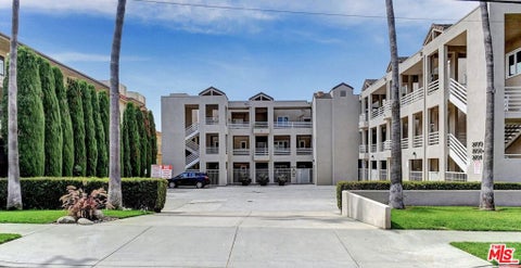 Photo of 2604 E 20th Street #205E, Signal Hill, CA 90755 (MLS # 26991059)