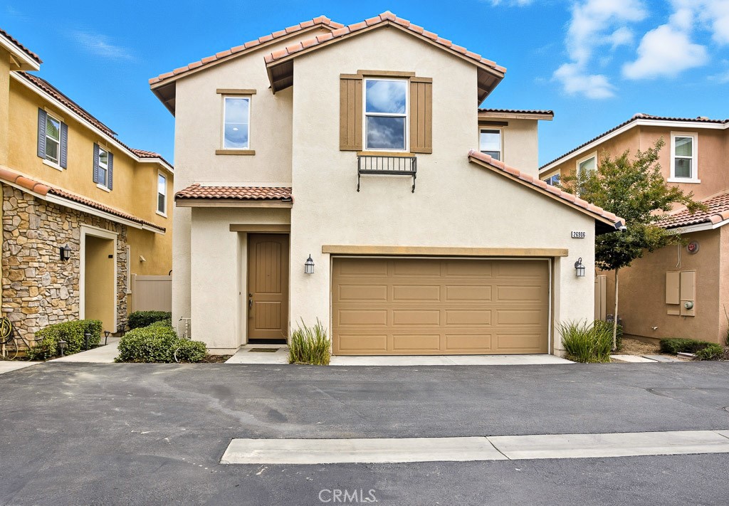 Welcome to this beautiful 3-bedroom, 2.5-bathroom home located in the highly sought-after gated Trestles community of Canyon Country. This home combines modern comfort with convenience and style. Step inside to find an inviting open floor plan featuring gorgeous ceramic wood tile flooring throughout the main level. The spacious living room flows seamlessly into the dining area and upgraded kitchen, which offers granite counters, rich shaker-style cabinets, stainless steel appliances, a center island, and ample storage. Upstairs, you’ll find 3 generously sized bedrooms, including a serene primary suite with dual sinks, a soaking tub, separate shower, and walk-in closet. Enjoy a private backyard, ideal for BBQs, entertaining, or relaxing in the sunshine. The home also includes an attached 2-car garage with a 220-volt outlet and comes with appliances included. Residents of Trestles enjoy resort-style amenities such as a community pool, spa, and playground. With no Mello Roos and a prime location near the 14 freeway, top-rated schools, shopping, dining, and more, this home truly has it all. Don’t miss your chance to make this your next home!