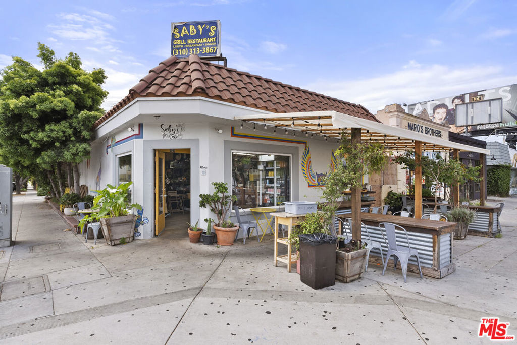 We are thrilled to present this exceptional opportunity in the heart of Mar Vista, located on the corner of one of West LA's most rapidly appreciating submarkets. This trophy property along the vibrant Venice Boulevard corridor offers a rare combination of value add potential with 50% upside in rents, or an exciting owner user restaurant or retail re-development, in a high-barrier-to-entry market. Currently, the properties are all leased to one family on an an absolute triple net basis. Tenant pays rent and all expenses, including repairs & maintenance, property taxes and insurance. One family member runs the market, another runs the cafe', and another lives in the apartment unit. The lease matures in July 2026 for all properties. Current rents are approximately 50% below market, which translates to big opportunity for the next owner. Great options for a new owner to: 1. Purchase, invest in interiors, and lease at market rents, or 2. Enlarge Cafe to over 2,600 sq. ft. by combining with attached unit & keep market free standing, or 3. Combine all three uses for over 4,300 sq ft of restaurant, retail or mixed-use space! Venice Blvd has over 47,000 cars per day passing by this location, great trendy restaurants and night life already exist on this intersection. First time on market in over 25 years! This is an exciting opportunity with strong upside, and can support flexible business plans for the properties.