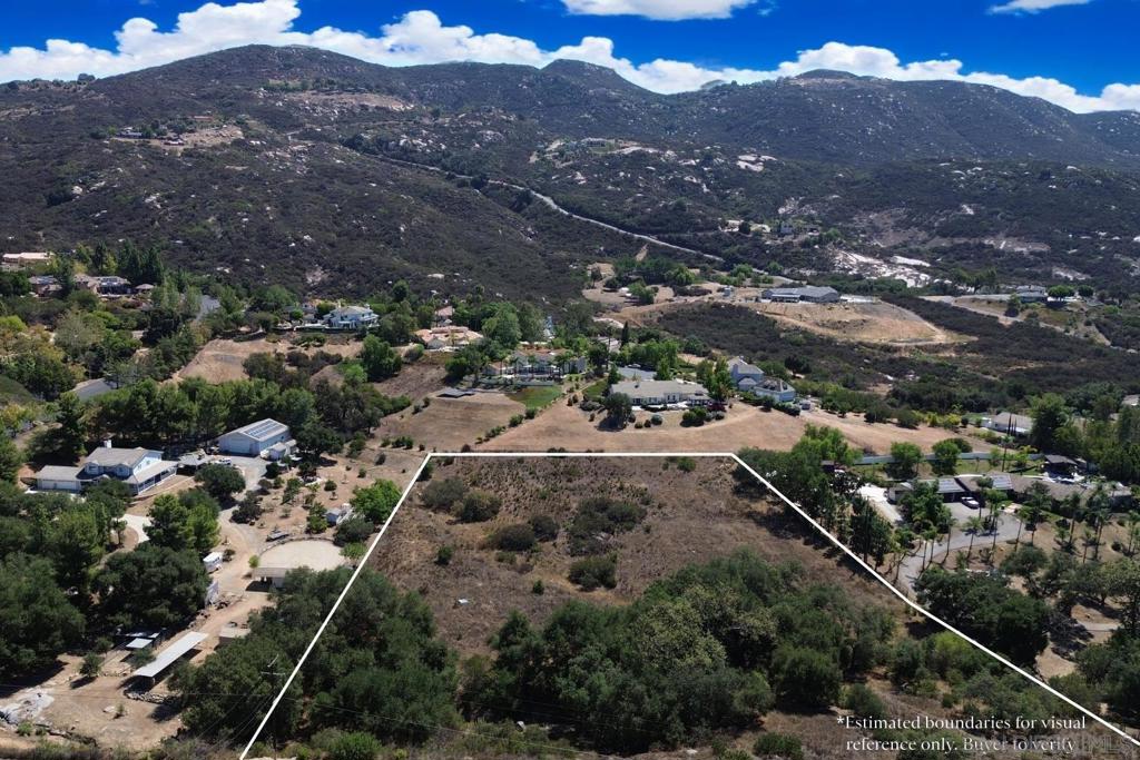Imagine creating your dream estate on 4.22 acres in Jamul Highlands, where stately oak trees, a seasonal stream, and wide-open views set the stage for a private retreat. Unlike many rural parcels, this property is directly off a main road, blending privacy with easy access. A water meter is installed, electricity is nearby, and a fire hydrant is close to the lot. Just 25 minutes from Downtown San Diego and under 10 minutes from schools, dining, and shopping. This expansive parcel provides a rare opportunity to design a lifestyle that combines natural beauty, convenience, and practicality. With generous usable land, there is room to create a custom residence tailored to your vision, whether you are planning equestrian facilities, a family compound, or outbuildings such as barns, workshops, or garages. The property’s setting among mature oak trees offers both shade and character, while the gentle seasonal stream adds to the charm and appeal of the land. Unlike many vacant parcels that can feel isolated or require difficult access, this lot benefits from its position directly off a main road, ensuring a balance of accessibility and privacy. Infrastructure is already in place to support development. A water meter is installed, power is nearby, and a fire hydrant is located close to the lot—important features that simplify the building process and enhance safety. The location offers the best of both worlds: the tranquility of Jamul’s countryside with the convenience of city amenities. In less than 10 minutes you can reach schools, restaurants, and local shopping, while Downtown San Diego is only a 25-minute drive. This proximity makes the property not only a beautiful setting for a primary residence but also a practical choice for those who value both lifestyle and connectivity. Opportunities like this are rare in Jamul Highlands, where parcels that combine natural features, ready-to-build infrastructure, and a desirable location are highly sought after. This land invites you to bring your vision to life and establish a residence of comfort and distinction in one of the region’s most desirable neighborhoods.