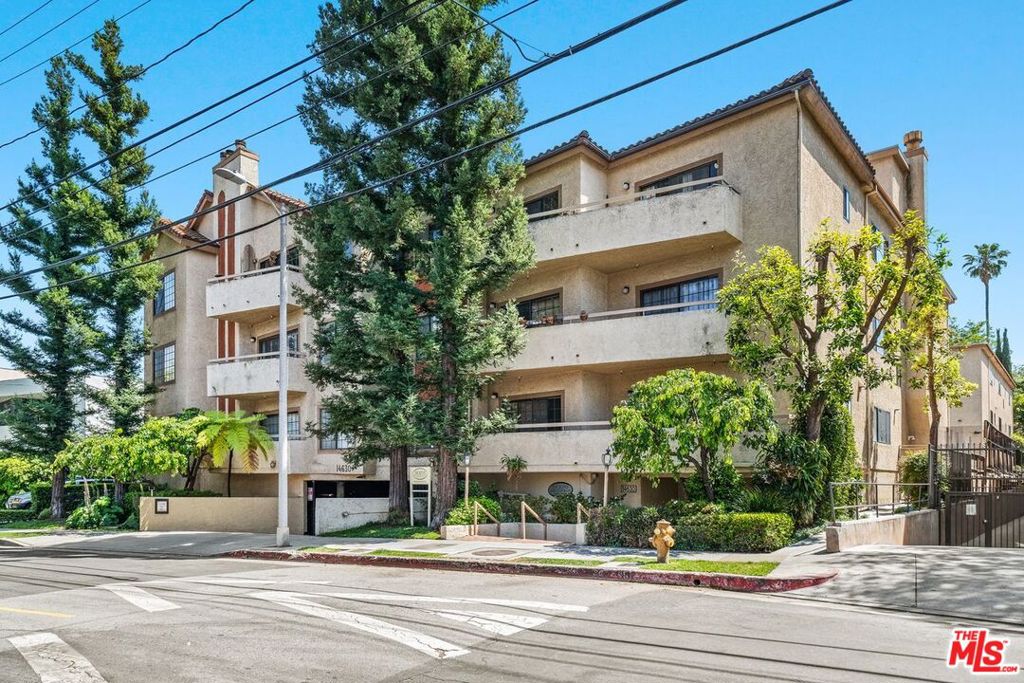 Prime Sherman Oaks spacious condo in a highly sought after South of Ventura Blvd. location. This single-story home has tall ceilings in over 1,730 sq ft of living space and many upgrades. This move-in ready property has 2 bedrooms, 3 baths and a den (easily converted to a 3RD bedroom) with plenty of living-room space to entertain. The main living area boasts a decorative fireplace and wet-bar. Enjoy the recessed lighting, new paint, and beautiful hardwood floors throughout the condo. The balcony right off the living-room overlooks the pool and spa. The kitchen features granite counter tops, a built-in range, stove, microwave, large refrigerator and leads to the elegant dining area. In the primary suite, you have plenty of closet space. The primary bathroom features a steam shower, jetted bathtub and double sinks. Other features include built-in California Closets, plantation shutters, in closet laundry with abundant storage, and lots of privacy. Gated 2 car tandem parking in secured garage includes guest parking plus a private storage locker. Dickens Contemporary Condominiums features an elevator, recreation room, gym, pool and spa. Easy access to fabulous dining, shopping options, Westfield Fashion Square and freeways.