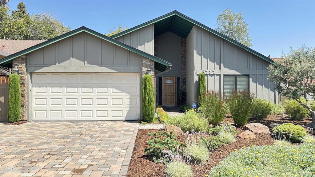 Welcome to 6777 Winding Creek Drive, a charming single-level home located in the heart of San Carlos. This 4-bedroom, 2-bath residence sits on a spacious 7,000 sq ft lot and offers a flexible layout with room to make it your own. Featuring a bright living area, attached 2-car garage, and a generous backyard perfect for entertaining, gardening, or ADU potential. Beautifully landscaped front and rear yards provide great curb appeal and outdoor enjoyment. Recent improvements include a newer roof installed approximately 7 years ago (per seller). A perfect canvas for your personal touches and style updates. Nestled on a quiet street near Mission Trails Regional Park, highly rated schools, and shopping. A fantastic opportunity in a highly desirable neighborhood.