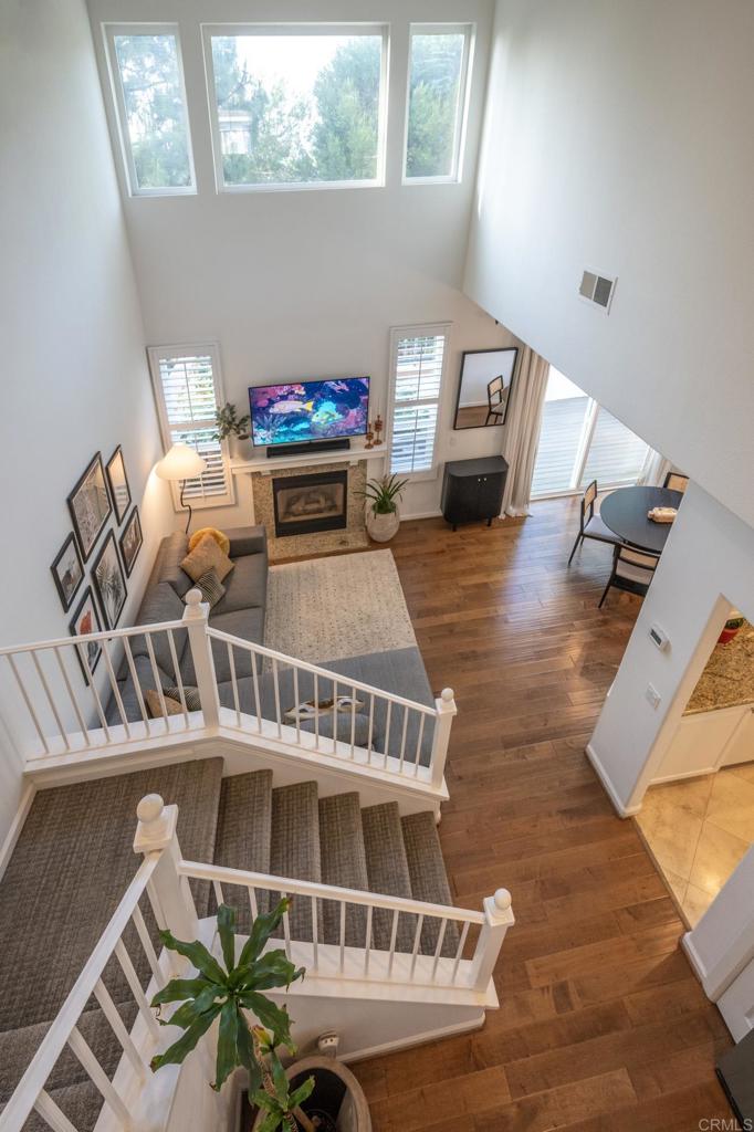 Beautifully remodeled townhouse. Accented by custom upgrades. Two story high ceilings and windows to show off views and let in natural light. Open floor plan with upgraded flooring, paint and A/C. Kitchen upgraded, Main Suite and Bathrooms also impressively upgraded with custom cabinetry, countertops, and flooring. Custom window treatments. Family room slider opens to custom patio and blooming landscaping. Backs to open space. Ample storage in 2-car attached garage. Located within the highly sought after Palmilla neighborhood with Pool, Spa, and Exercise Room in the Heart of Carmel Valley.