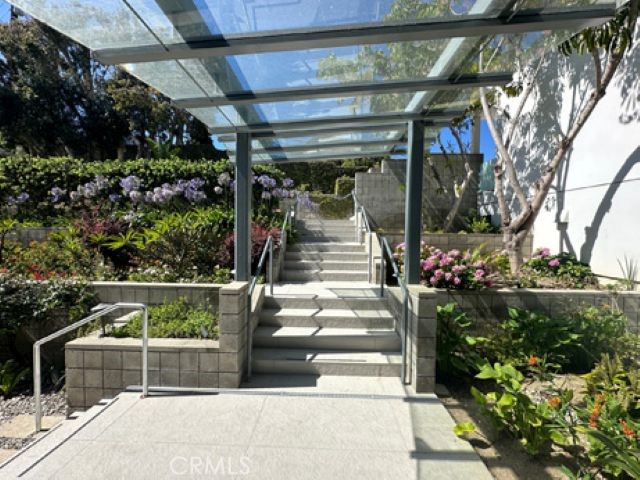 Incredible unfurnished 2-bedroom, 2 bath home with sweeping 180-degree ocean views from end to end. Situated in the coveted “Civic Center Drive” area 1-block away from Pepperdine University, tucked above the shopping center. Welcome to your new, contemporary home behind private gates. This unit shares the property with the primary residence but comes with its own private entrance, complete with private yard area. The home features renovated interiors, 2 primary suites (one with mountain views, the other with ocean views) in quiet neighborhood. This is the perfect discrete home or weekend getaway. Oversized walk-in closets in both bedrooms, as well as en-suite bathrooms. Home also features an open floor plan Great Room featuring living, dining, and kitchen all boasting ocean views. Updated features throughout as well as two off-street parking spaces behind the gates. Must see this gorgeous home to believe!