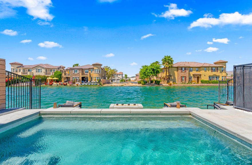 Terra Lago Lakefront estate recently built in 2022. Rare 5 bedroom 4 bath plus office that can comfortably sleep 14+ for maximum enjoyment or maximum income as a resort rental. The entire property has been renovated and set up to be a luxurious lakefront rental with designer furniture, huge TVs, arcade machines, and completely developed backyard. The large primary suite offers a private balcony overlooking the serene lake and pool, with panoramic mountain views that will take your breath away. Smart home features including smart entry, thermostats, EV charger, and solar panels on the roof. Residents enjoy resort-style amenities, including a community pool, clubhouse, fitness center, and an 18-hole golf course. Plus, HOA dues cover free Internet, cable TV, gym, community center, and 24-hour guard-controlled access. Whether you're looking for a luxury residence, an Airbnb, or a 1031 exchange, this home offers it all very close to Coachella Valley's best events, including Coachella Music Festival, Stagecoach, Polo, Palm Springs, Joshua Tree National Park, and major Casinos. Don't miss the opportunity to make this extraordinary lakefront retreat your own! Short-term rentals allowed--excellent investment potential!