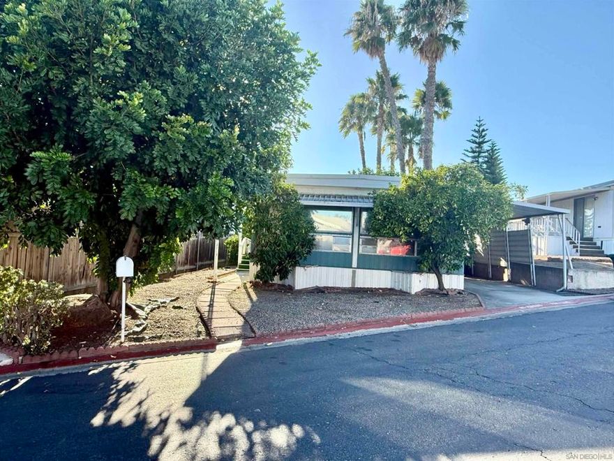This manufactured home offers 2 bedrooms, 1 bathroom, and approximately 800 sq. ft. of potential in a highly desirable all-age, resident-owned community. The home is in need of a complete remodel, making it an excellent opportunity for a buyer looking to create their own dream space. Located in one of the best spots within the park, the property features a covered carport and room for a patio or small garden. Enjoy the rare benefit of true ownership—no space rent and no land lease—helping to keep long-term costs affordable. The community is family-friendly and well-maintained, with low monthly HOA, with an inviting club house, pool and play ground for the entire family. The park is conveniently situated near shopping, dining, schools, and freeway access, this property combines location, affordability, and investment potential. This property offers a unique opportunity to place a new home in this amazing location! Bring your vision —this is a rare chance to build equity and own in a welcoming Escondido community!