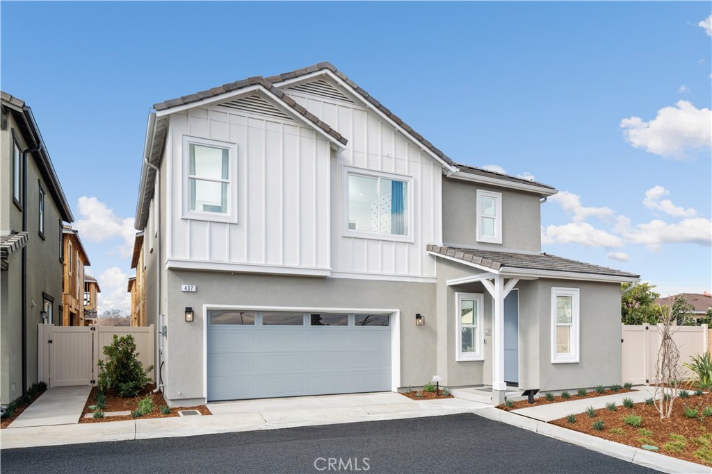 **MODEL HOME FOR SALE! FULLY FURNISHED AND READY TO MOVE IN BY LATE AUGUST!**
Introducing a stunning model home in the Willow community by KB Home, located in the thriving city of Carson, CA. This thoughtfully designed two-story residence offers approximately 2,092 square feet of modern living space, featuring 4 bedrooms and 3 bathrooms. Step inside to a bright and open layout that includes a spacious great room with large quad sliding glass doors, allowing for seamless indoor-outdoor living and plenty of natural light. The gourmet kitchen is a chef’s dream, complete with a large center island, stainless steel appliances, stylish cabinetry, and USB charging ports for added convenience. Downstairs, you’ll find a full bedroom and bathroom, ideal for guests or a home office. Upstairs, a versatile loft provides flexible space for a media room, play area, or study zone. The luxurious primary suite includes a large walk-in closet and spa-inspired bath with dual vanities, a soaking tub, and a separate frameless-glass shower. Additional features include an upstairs laundry room and a two-car garage. As a model home, this residence is loaded with high-end designer finishes, energy-efficient systems, and is prewired for solar. Nestled in a commuter-friendly location near schools, parks, shopping, and dining, Willow offers a well-rounded lifestyle in a growing neighborhood. This is your chance to own a home where thoughtful design meets everyday comfort.