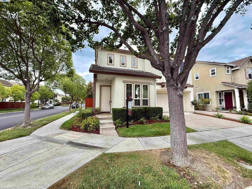 Welcome to this beautiful EAST-facing corner lot home in the heart of Stoneridge Square! With over 2,000 sq. ft. of living space, this home offers 4 spacious bedrooms, 2.5 baths, and the ease of an upstairs laundry room for convenience. A light-filled living and dining area with custom cabinetry and laminate flooring that flows into the newly updated kitchen with gorgeous quartz countertops and backsplash and new appliances. The kitchen opens into the family room, where a fireplace and custom media cabinet create the perfect spot to effortlessly gather and unwind. Lovingly maintained by the original owners, this home has been thoughtfully updated to offer both comfort and peace of mind. A newer 3 ton HVAC system with central in-line HEPA air filter ensures clean, refreshing air throughout, while the convenience of an added wired network plus security cameras provides capabilities for nextgen data and smart living possibilities. Outside, enjoy a backyard with a custom cobblestone, a thriving lemon tree and plenty of space to garden or simply unwind. Just blocks from top-rated Mohr Elementary, scenic parks, shopping, and dining, this home truly blends modern comfort in a prime location!