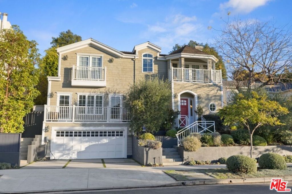 This beautiful two-story Cape Cod-style home near the beach offers a comfortable and elegant place to settle during your rebuild. Thoughtfully designed with warmth and functionality, this home provides a sense of peace and stability in a time of transition. The living room and formal dining room feature gorgeous hardwood floors, and the spacious kitchen opens to a cozy family room with a fireplace perfect for relaxing evenings. The kitchen is fully equipped with high-end appliances including a WOLF range, Sub-Zero refrigerator and wine fridge, Cove dishwasher, a large center island, and granite countertops. A casual dining area opens to the lovely back patio, making everyday meals easy and enjoyable. With two bedrooms downstairs and three more upstairs including a spacious and serene primary suite with sitting area, fireplace, and private balcony, you'll find plenty of room for everyone. The primary bathroom is bright and airy, and the entire home feels open, clean, and calm. The backyard is an entertainer's dream, with a built-in Wolf BBQ, Sub-Zero refrigerator and ice maker, granite counter space, and a beautiful outdoor fireplace ideal for quiet weekends or small gatherings. A wine cellar and direct access to a two-car garage add to the home's ease and convenience. This is a wonderful opportunity to feel truly at home in Pacific Palisades while you rebuild.