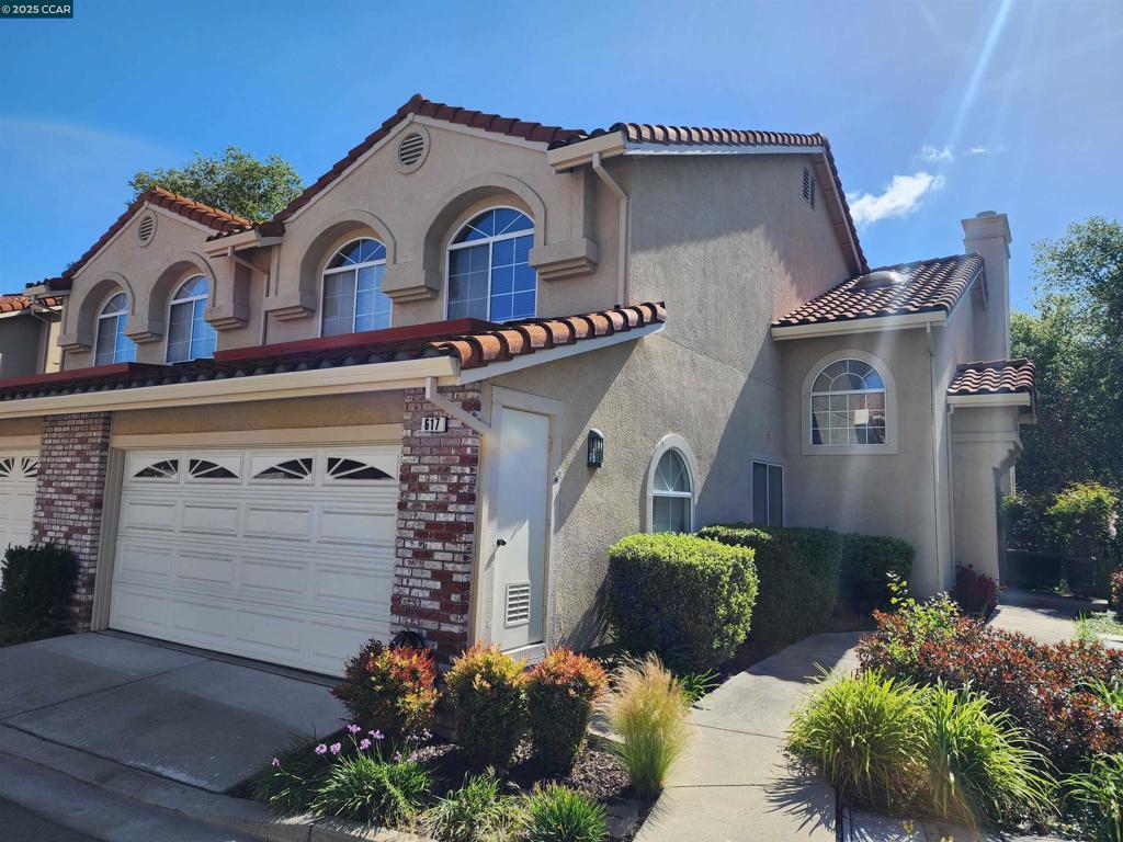 Excellent location in the development plus extra parking in front. Granite counters, stainless appliances, washer, dryer and refrigerator included. End unit with no rear neighbors, conveniently located to top rated K-12 San Ramon Valley Schools, trails, parks and shopping. Rarely available 4 bedroom townhouse including living room, formal dining, separate family room, fireplace, inside laundry, spacious patio, attached 2 car garage. HOA includes community pool, greenbelt and front exterior maintenance.