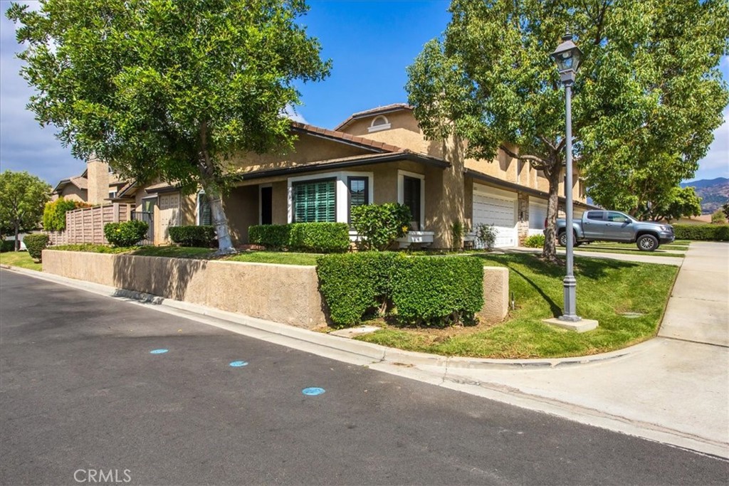 Charming 2 Bed, 2 Bath Single-Level - End Unit Condo in Beautiful Glendora!
Welcome to this bright and inviting 2-bedroom, 2-bathroom single level, end unit condo located in the heart of Glendora. With 1,145 square feet of comfortable living space—all on one level—this home offers a functional layout and a prime location that’s hard to beat. Step into a light-filled kitchen with a cozy dining area overlooking the private fenced patio—perfect for morning coffee or evening barbecues. The living room features a fireplace with a mantle, creating a warm and welcoming space to relax or entertain. Enjoy wood flooring in the main areas, with carpet in the bedrooms and living room, and tile floors in both bathrooms. The spacious 2-car attached garage provides convenience and extra storage. Located just minutes from the 210 Freeway, shopping centers, and a variety of dining options, this home truly puts you in the center of it all. Community amenities include a pool, spa, and pickleball court—ideal for staying active and social. The HOA covers water, trash, roof maintenance, and more, offering both value and peace of mind. Don’t miss your chance to own this beautifully maintained home in one of Glendora’s most desirable neighborhoods. Make this prime location yours today!