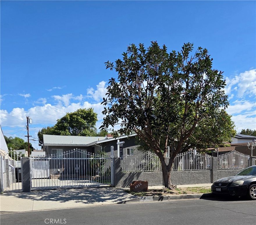 Don't miss the opportunity to lease this fully gated & spacious 3+2 home that offers a formal living room with chandelier, family room, updated kitchen and separate laundry room with washer/dryer hook-ups.  Stay cool in the summer with central a/c; your winters will be cozy with the wood burning fireplace in the living room and central heat throughout.  Recently painted interior, all new light fixtures in each bedroom & bathrooms as well as new hardware on doors and a new 50gal water heater. Utilities included!  There is a detached garage in back that is an ADU.  There will be a privacy fence between the house and that unit.  Call for a showing.