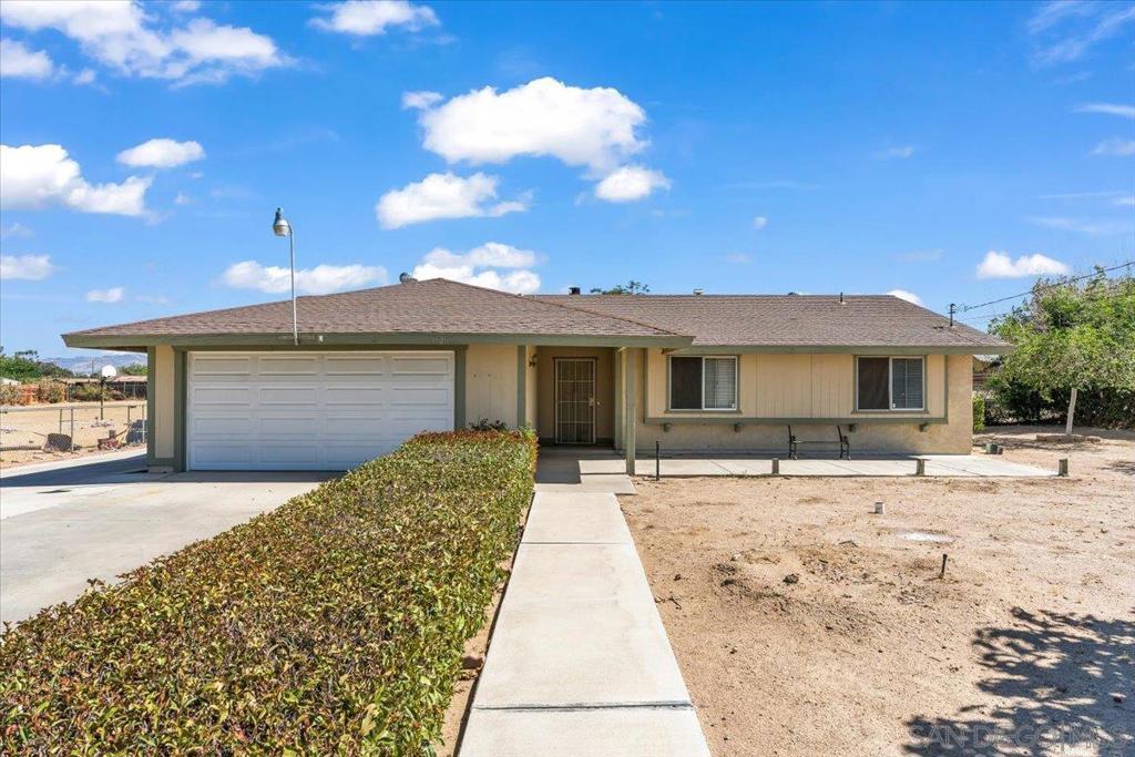 Set on a spacious lot in the heart of Hesperia, this 3-bed, 2-bath home offers 1,330 sqft of living space. Built in 1985 on a quiet street near schools, dining, & commuter routes. This single story home has two sets of French doors separating the foyer and kitchen from the living room. Includes his-and-her closets in the main bedroom, a wood-burning fireplace, central air, swamp cooler and ceiling fans. Outside, a long driveway leads to a 2-car garage with extra parking & RV space. The large back yard has mature trees and a covered patio. With ample space inside & out, this property is ideal for those looking for an opportunity to update or customize a home with no HOA fees. Light and bright with a freshly painted interior this home is move in ready in! The large back yard has mature trees and a covered patio. With ample space inside & out, this property is ideal for those looking for an opportunity to update or customize a home with no HOA fees. Light and bright with a freshly painted interior this home is move in ready in!