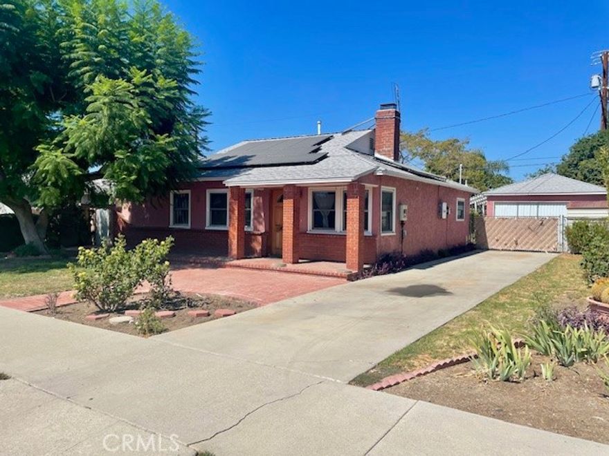 Hurry! The price has just been reduced $24,950, it's priced to sell. Don't miss this opportunity! This excellent family home features an exterior with beautiful curb appeal with mature landscaping, brick accents, and a long concrete driveway which leads to a two car detached garage with plenty of off-street parking. The interior has a formal living room with a custom floor to ceiling brick fireplace. The huge kitchen has been remodeled with tons of quality cabinets. Note:There are two separate pantries, granite counters, double electric "Professional Series" ovens, and plenty of room for dining. The master bedroom has a private bathroom. The home also has central refrigeration and heating, upgraded windows, and solar power. There is also a very large screened in lanai perfect for a game room or gym. Outside is a beautiful backyard with mature landscaping, a brick patio, and block-wall fencing. Note: The solar system will be paid-off at the close of escrow!