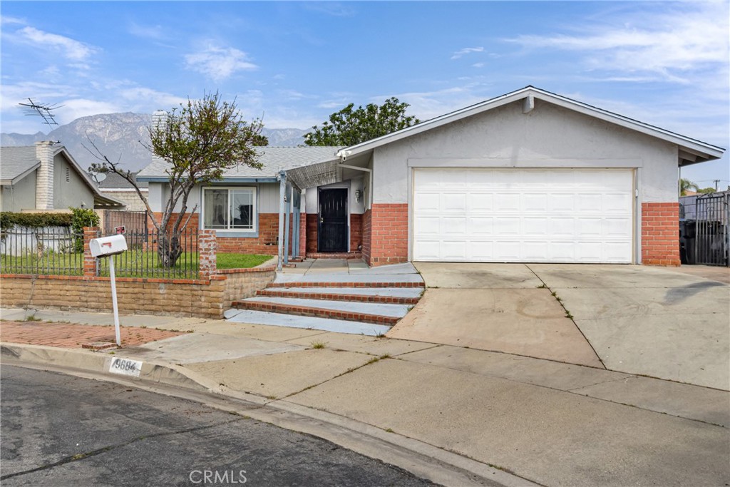 Now Available for Lease in Rancho Cucamonga!
Tucked at the end of a quiet cul-de-sac, this well-maintained single-family home offers rare privacy with no neighbors on one side—perfect for those seeking a peaceful retreat.
Inside, you’ll find a bright and open floor plan with soaring ceilings and plenty of natural light. The home features 3 spacious bedrooms (including a primary suite with its own fireplace and brick accent wall), 2 full bathrooms, and a dedicated laundry area.
The kitchen includes a center island and flows into the dining space, opening to a covered patio and private backyard—great for relaxing or entertaining. Additional highlights include a 2-car attached garage with flexible use potential (gym, studio, or workshop), plus an extended driveway with ample parking.
Located in a highly desirable neighborhood, you’ll enjoy quick access to Victoria Gardens, top-rated schools, and the 10, 15, and 210 freeways.
Now scheduling tours! Apply today to make this beautiful Rancho Cucamonga residence your next home.