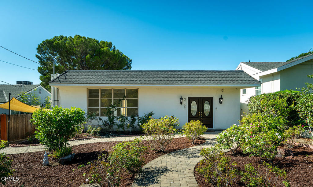 Welcome to 3144 Brookhill st in the beautiful city of La Crescenta. This home has a lot more than meets the eye. The main house is a 3 bed/ 2 bath 1566 square foot home but there is an additional 339 square foot converted space with a separate entrance in the back. This bonus area can be used as additional living space, an office, or whatever your heart desires since it has its own mini kitchen and bathroom. This total square footage was measured to be 1905. You are welcomed when entering the main house with a bright front living room with a fireplace and views of the foothills to one side as well as yard views on the other. This room have amazing natural light. Close to the front room there is 1 bedroom with a deep closet to the right before the kitchen area. The kitchen comes with all that is needed for great family living including refrigerator, oven, gas range, and a new dishwasher. Across from the kitchen is an area that is well suited for dining. Further down the hall there is the second bedroom and a bathroom. The master suite is in the back that of course has its own bathroom with dual vanity and separate shower and bathtub. The yard starts on the side and blends to the back and has plenty of room for hosting parties, patio barbequing, or just soaking up the quiet vibe of La Crescenta. There is a dethatched garage and a carport that can hold multiple vehicles and assist with storage. The rear portion of the property is lines with various fruit trees that can provide apricots, peaches, persimmons, apples and more. The rear of the home hosts the entrance to the bonus studio with its own mini kitchen and bathroom. The location is close to local parks, hiking trails in the Verdugo mountains and San Gabriel mountains that are great for mountain biking and recreational use. Local schools are Monte Vista elementary, Rosemont middle school, and CVHS. For commuters, La Crescenta is a quick shot to JPL, Downtown Los Angeles, Glendale, and the Burbank studios. Come check out this home before it is gone and visualize how merry the holiday season could be.