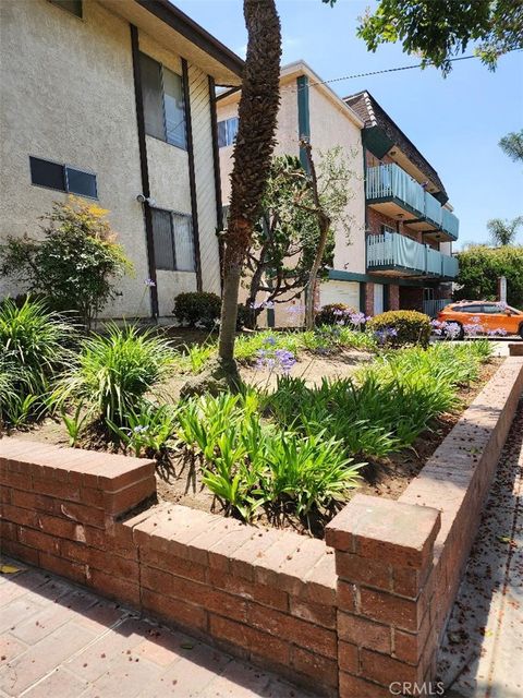 Photo of 15116 S RAYMOND Avenue #104, Gardena, CA 90247 (MLS # SB25279475)