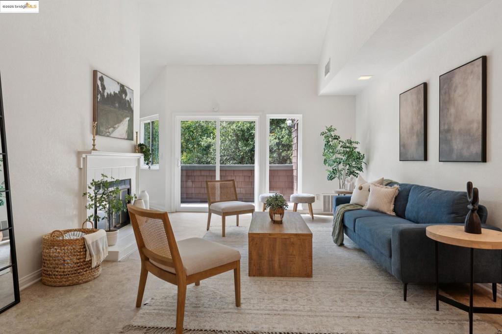Offered for the first time in over 25 years, this 2-bedroom, 2-bath upper unit condo blends comfort, convenience, and the chance to make it your own. The living room’s soaring ceilings and abundant natural light create a spacious, inviting feel, while the private patio offers rare, serene creekside views. Recently refreshed with new appliances, new bedroom carpet, and an in-unit washer/dryer, it’s move-in ready yet leaves room for personal touches. Walking trails are just behind the building, and you’re moments from grocery stores, coffee, parks, and quick freeway access to both Hwy 4 and I-680. With two deeded parking spaces—one carport and one garage—this long-treasured home is a rare Pleasant Hill opportunity, ready for its next chapter.