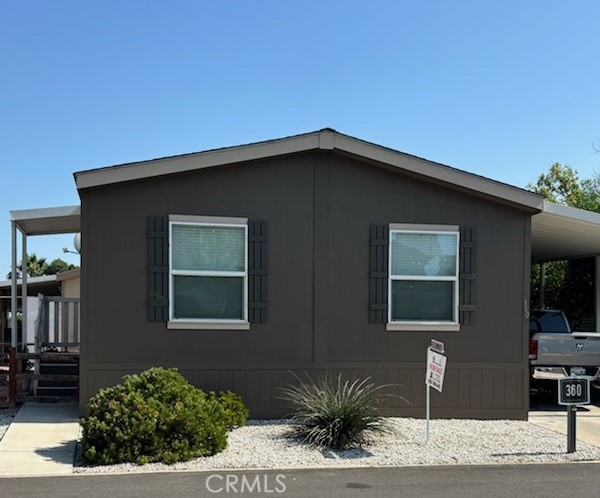 3 bed, 2 bath manufactured home in Turn-key immaculate condition. Only seven years old, built in 2018. Open floor plan. Ceiling fans. Smart thermostat controlled AC & Heat. Coded door lock. New Roof and Awning. Shed. Located in peaceful and serene Country Lake 55+ community. Clubhouse with many activities, pool, spa, bathrooms and laundry. Enjoy the beautiful views of the park's tree lined streets and nearby mountains, while you drive or walk around the lake or fish from the docks.