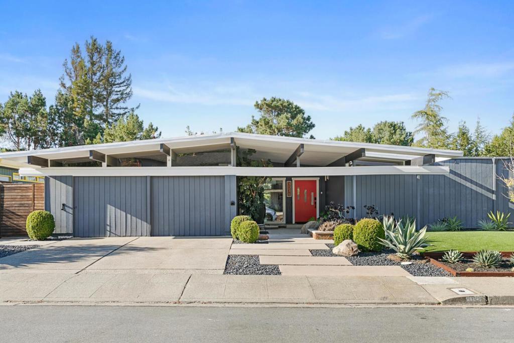 Meticulously reimagined Joseph Eichler mid-century modern, fully renovated with no detail overlooked. This 4BR + office, 2.5BA home blends iconic architecture with luxury updates: an enclosed atrium foyer, custom modern kitchen, spa-like baths with designer finishes, and radiant natural light throughout. Professionally landscaped grounds feature rebuilt fencing, complete privacy, hillside backdrop with Bay views, Bullfrog spa, and imported steel pergola. A true high-end Eichler restoration for modern living. Amazing indoor/outdoor living on a flat lot with outdoor kitchen, louvered roof pergola, and in ground hot tub. Quick access to 280 and to Franklin Elementary and Burlingame Intermediate Middle schools.
