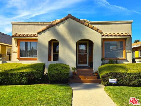 Photo of 5303 S Manhattan Place, Los Angeles, CA 90062 (MLS # 26655779)