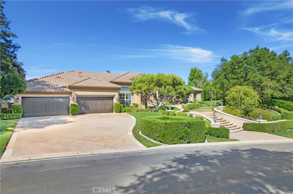 Situated in the guard-gated community of Coto de Caza, this single-level residence exemplifies exceptional design with ridge-top views. Nestled on nearly an acre of land, with a panoramic view of Saddleback Mountain, Cleveland National Forest & the Coto de Caza Valley. The well-designed floor plan boasts 13-ft ceilings, travertine flooring & custom woodwork that creates a sense of luxury. The LR & DR provides a sense of grandeur with a cast stone floor-to-ceiling fireplace and French doors overlooking the pool and expansive backyard. A stunning walk-in wine room built by Vista Wine Cellars centers the home. Enter through Hubbard custom iron doors to Venetian plaster walls, handmade floor tiles, and accented with Idaho Quartz stone. The temperature-controlled room with a separate wine refrigerator for white wine, detailed cabinetry, and seating is one of a kind. The chef's kitchen is a culinary masterpiece, boasting a Sub-Zero refrigerator, Viking 6-burner range with griddle and an abundance of cabinetry. The kitchen nook with backyard view and countertop seating joins the FR with Idaho Quartz stacked stone fireplace, wet bar, and impressive sound system. The finely appointed Primary suite with and backyard access is sure to impress. The Primary Bath w/ skylights for all day natural light, dual vanities, jetted tub, and large walk-in shower, dual commode areas are connected to a walk-in closet. Two large secondary bedrooms and a Jack and Jill bath complete this wing of the home. An additional large bedroom (currently being used as an office) with a private bath and backyard access offers versatility as an in-law suite or bonus area. The breathtaking backyard oasis takes full advantage of the mountain and valley view. The Pebble tech pool & spa centralizes the generous patios. Stone accented BBQ cooking area with the most impressive backdrop, dazzling all your guests! An elevated fire pit is perfect for those nighttime gatherings. Large California oak trees, a grass area & a vegetable garden complete the backyard. 4 garage with epoxy flooring (2-car garage being used as a wood workshop). This residence epitomizes the finest of Coto living, offering access to biking & hiking trails, parks, & sports courts. Residents also have the option to enjoy the amenities of the Coto de Caza Golf & Racquet Club for an additional fee, which features two Robert Trent Jones Jr.-designed golf courses, tennis courts, pickleball courts, a spa, a gym, pro shops, and restaurants.