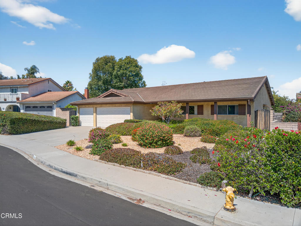 First time on the market! Welcome to this single-story home with 4 bedrooms, 2 bathrooms, and 1,883 square feet of living space. Thoughtfully maintained by its original owner, this home offers a 3-car garage, a wide driveway, and a low maintenance, landscaped front yard.Inside, you'll enjoy central air conditioning, vaulted ceiling and newer wood-look flooring in the living and dining rooms, and a cozy brick fireplace that adds warmth and charm. The kitchen features tiled counters, ample cabinetry, and a bright breakfast nook with views of the backyard. Adjacent to the kitchen is the family room ready for relaxation. The primary suite offers private access to the backyard and a walk-in closet. Step outside to a large covered patio, grassy area, and a wide side yard--perfect for outdoor dining, gardening, or future customization. Located just moments from Lokker Park, this home presents a rare opportunity to settle into a beloved neighborhood and make it your own.