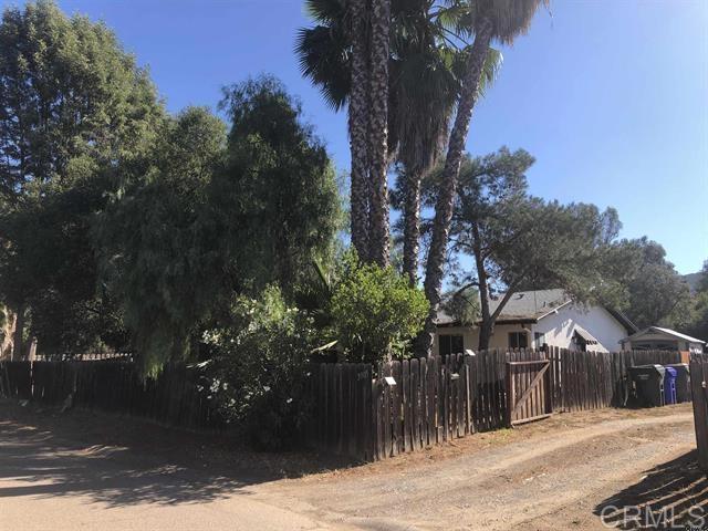 OPPORTUNITY HAS ARRIVED! Quaint Duplex is Rural Fallbrook Community of Rainbow, CA. Both Units are Tenant Occupied to Provide Immediate Rental Income or Live in One and Rent the Other for More Opportunity to Enjoy Rental Income and Your Very Own Slice of County Peace. Each Unit has Fenced Front Yards and the North Unit has a Large Fenced Back Yard. South Unit has Access to the Remaining Section of the Large Flat Lot with Various Fruit and Citrus Trees Bordering the Property. Two Out Buildings Provide Storage and a Rustic County Feel. Each Unit is a 2 Bedroom, 1 Bathroom, Approximately 960 Sq Ft Situated on a 0.59 Acre Parcel Serviced by an Advanced Treatment Septic System. Come Visit and You Will Want to Make this Special Slice of Rainbow your Pot of Gold.