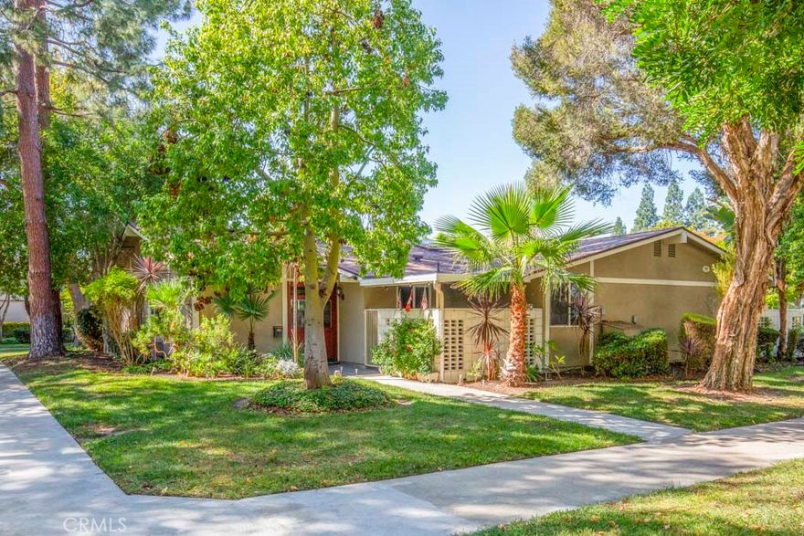 Spectacular remodeled two-bedroom, one-bath, single-level Valencia residence in a prime location in the Laguna Woods senior community. Enjoy the panoramic view of the wooded greenbelt and Serpentine walk from the large living room window with the neighboring buildings far in the distance. This location is far from road noise yet convenient to gates 1-3 and several clubhouses. The interior has been fully remodeled and offers countless upgrades and amenities including central heat and air, full-sized stackable washer/dryer and dual pane windows. Multiple skylights open to provide fresh air throughout the home. This home boasts an enormous walk-in pantry (formerly the interior atrium) that offers a vast amount of storage capacity. The exterior entry path to the front door is beautifully landscaped. The large outdoor patio is covered for year-round entertaining and relaxing. The assigned carport is close and offers lots of extra storage. This is one of the best rental opportunities currently on the market. Do not miss!