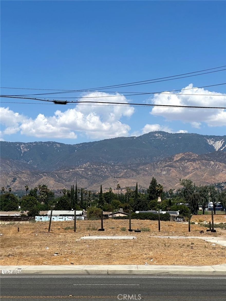 Build your dream home.  This flat lot located on the main street of Baseline Ave.  Close to major business and minutes away from San Bernardino International Airport.  Buyer to do their own due diligence in verifying all utilities, zoning, access, boundaries and all aspects of the property.  Great investment opportunity.