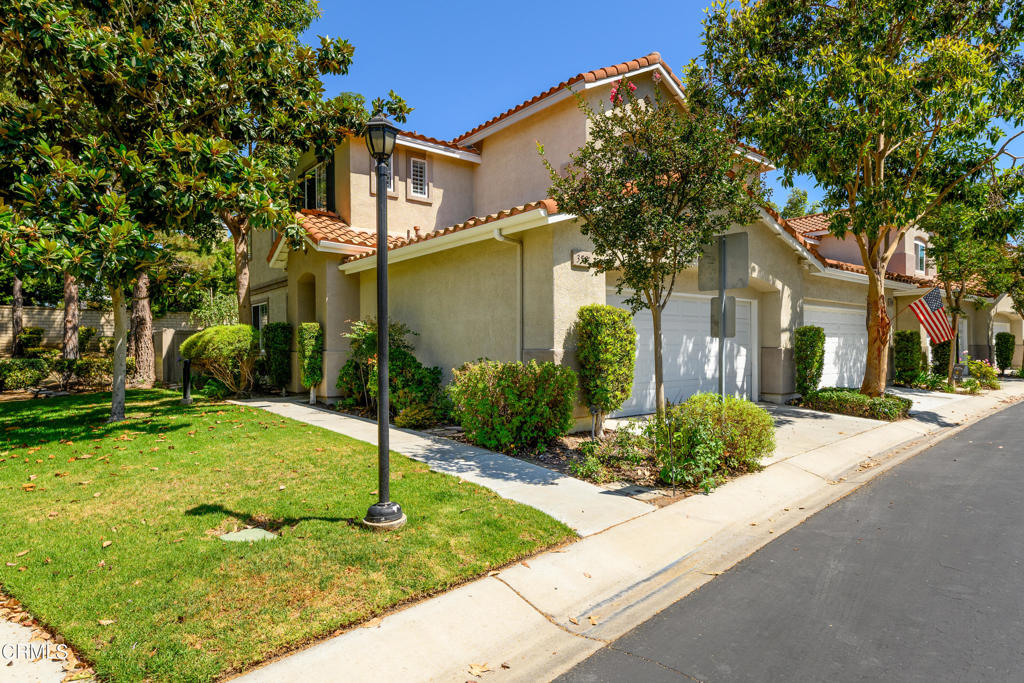 Live your best life the sought-after development of Los Arboles! A golden opportunity in the Mission Oaks area of Camarillo for a desirable end unit that is situated on a premium lot with no units behind! This beautiful townhouse features 2 bedrooms, 2.5 baths and a builder-option loft that's ideal for home office, playroom or studio, and can be converted into a 3rd bedroom if or when your needs require. A floorpan that is laid out in fine fashion fits a sweet spot ideal for couples, small families, move up buyers, empty nesters, professionals or investors, and lends to comfortable living for every day, casual and formal occasions. John Thomas Wood Shutter window treatments let natural light flood in, and the uniquely charming, bronze chandelier adds a fine touch of ambiance in the formal dining area. Recent renovations include the primary bath shower and freshly installed oven in the kitchen, which boasts quartz countertops with travertine tile backsplash, oil-rubbed bronze fixtures, drawer/cabinet pulls, single panel cabinetry/drawers, and recessed lighting. Crown moulding and high baseboards throughout aesthetically please the eye. Central air conditioning and ceiling fans in the family room and primary bedroom comfortably cool in warm summer months. Relax in the private, park-like back yard with water-wise synthetic grass while enjoying sunset colors filtering in, which are also seen from the Primary Bedroom. The home also features engineered hardwood and tile flooring throughout, gas fireplace, an owned Life Source whole-house water purification system, and convenient direct entry from the 2 car garage. Community amenities include a pool, spa, playground and RV lot, and guest parking is advantageously across the street from this home. Nearby restaurants, businesses, freeway access, Calleguas Creek Bike Path, Camarillo High School and the historic Camarillo Ranch House make for an ideal location!