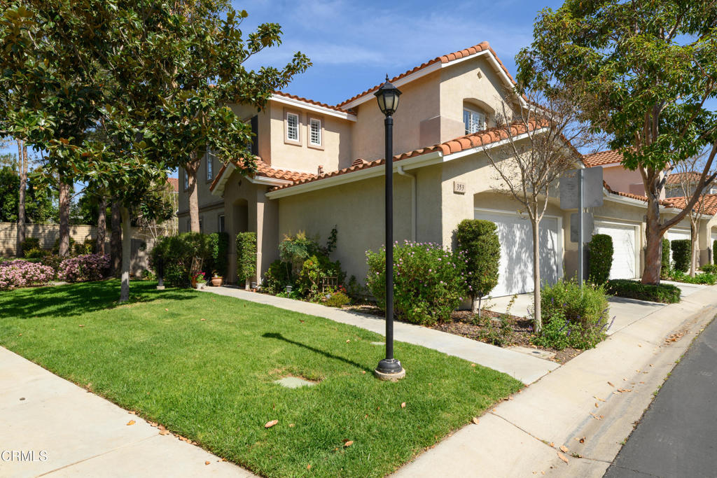 Live your best life the sought-after development of Los Arboles! A golden opportunity in the Mission Oaks area of Camarillo for a desirable end unit that is situated on a premium lot with no units behind! This beautiful townhouse features 2 bedrooms, 2.5 baths and a builder-option loft that's ideal for home office, playroom or studio, and can be converted into a 3rd bedroom if or when your needs require. A floorpan that is laid out in fine fashion fits a sweet spot ideal for couples, small families, move up buyers, empty nesters, professionals or investors, and lends to comfortable living for every day, casual and formal occasions. John Thomas Wood Shutter window treatments let natural light flood in, and the uniquely charming, bronze chandelier adds a fine touch of ambiance in the formal dining area. Recent renovations include the primary bath shower and freshly installed oven in the kitchen, which boasts quartz countertops with travertine tile backsplash, oil-rubbed bronze fixtures, drawer/cabinet pulls, single panel cabinetry/drawers, and recessed lighting. Crown moulding and high baseboards throughout aesthetically please the eye. Central air conditioning and ceiling fans in the family room and primary bedroom comfortably cool in warm summer months. Relax in the private, park-like back yard with water-wise synthetic grass while enjoying sunset colors filtering in, which are also seen from the Primary Bedroom. The home also features engineered hardwood and tile flooring throughout, gas fireplace, an owned Life Source whole-house water purification system, and convenient direct entry from the 2 car garage. Community amenities include a pool, spa, playground and RV lot, and guest parking is advantageously across the street from this home. Nearby restaurants, businesses, freeway access, Calleguas Creek Bike Path, Camarillo High School and the historic Camarillo Ranch House make for an ideal location!